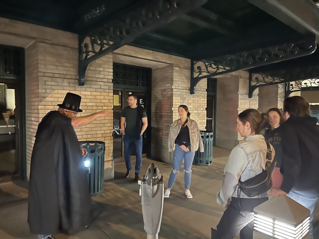 Tour guide explaining something on the tourists